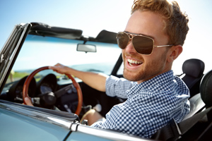 happy guy in car